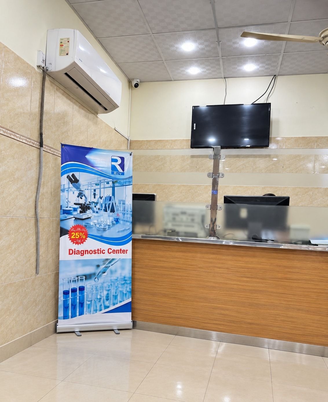 The reception counter with a Rizvi banner